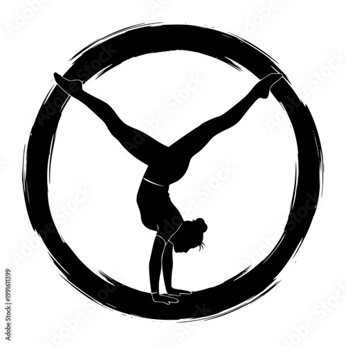Graceful gymnast performing an impressive handstand on a circular hoop in mid-air