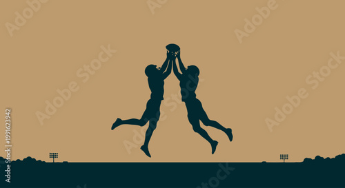 Football players reach for a ball in mid-air during a competitive game silhouette against a solid background.