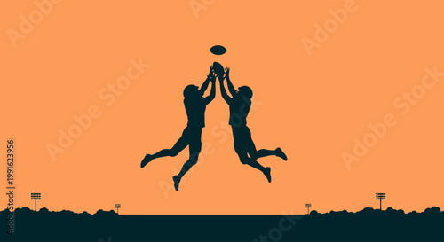 Football players jump into the air to catch a ball against an orange sunset background during a competitive game.