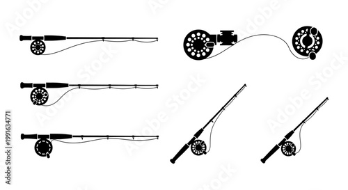Fishing rods with reels on white.