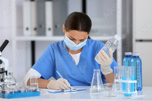 Female young scientist with...