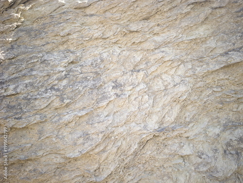 Schilderij op canvas Texture di roccia sedimentaria stratificata con livelli irregolari, tonalità mar