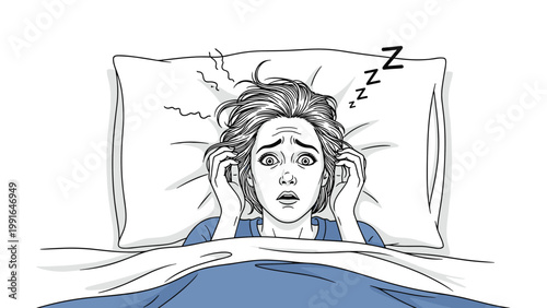 Stressed woman lies awake in bed with messy hair and wide eyes because she is suffering from chronic insomnia issues.