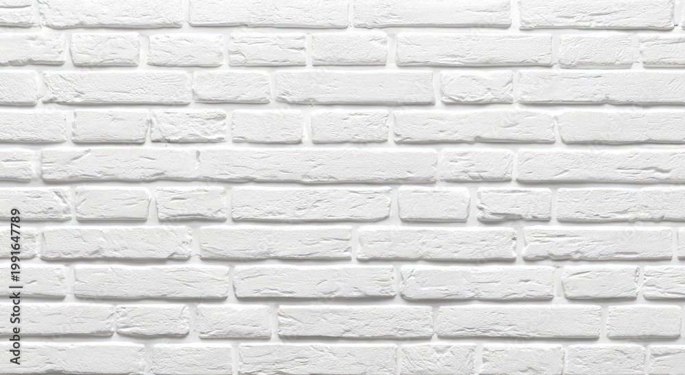 Obraz premium A close-up view showcases a textured white brick wall, highlighting the individual bricks and their mortar joints in a clean and modern aesthetic.