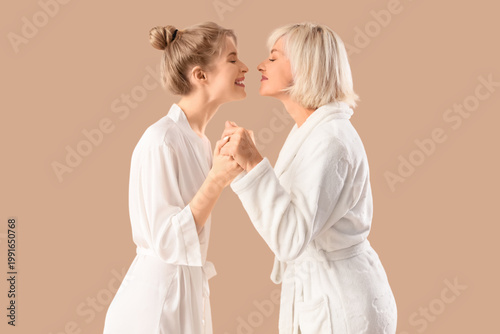 Happy young woman and her m...