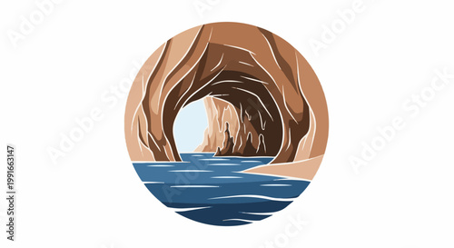 Scenic ocean cave entrance with calm blue water and sandy shore