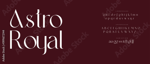 Tableau sur toile A modern typography design featuring the Astro Royal font on a dark red backgrou