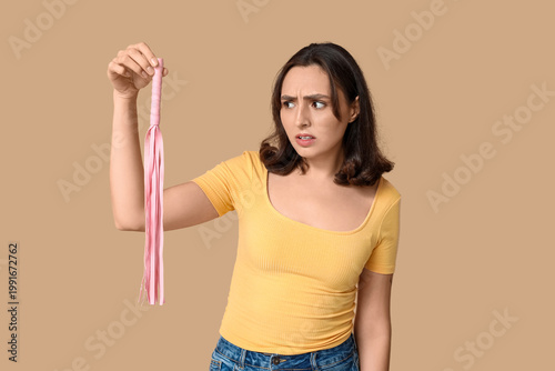 Emotional young woman with ...