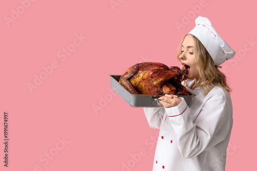 Hungry female chef eating t...