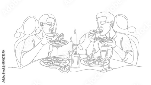 Couple enjoying a romantic dinner together.