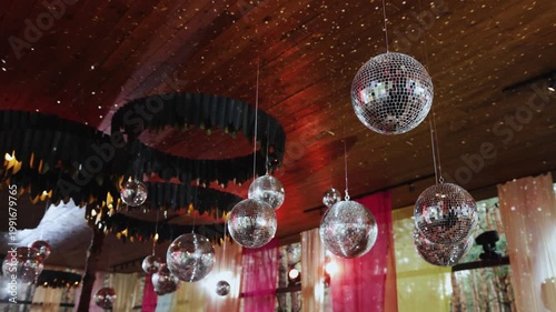 Glittering Disco Balls Above Romantic Reception, Soft Confetti Drift, Pastel Drapes, Wedding Planner Styling