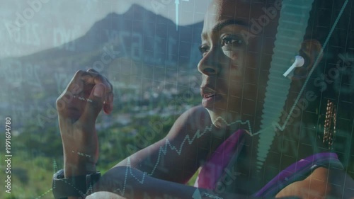 Runner finishing breath, raising wrist, checking watch, charts crossing frame tracking fitness