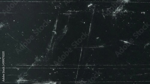 Dynamic animation of random grunge textures and glitch elements on a black background. This fast moving visual overlay is perfect for adding a horror, cinematic, or retro aesthetic to video edits