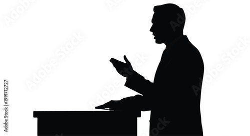 Silhouette of a professional speaker giving a speech at a podium.