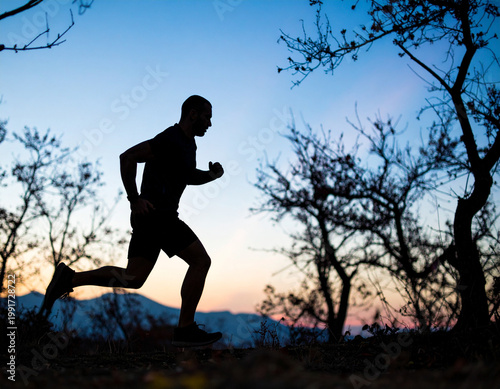 Silhouette of Athletic  man running , fitness and healthy lifestyle, cinematic style,