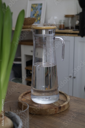 Glass Water Pitcher on Wooden Countertop