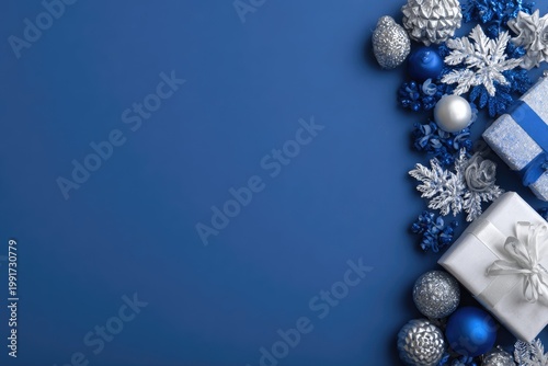 Festive blue backdrop w/ ornaments, snowflakes, and gifts along the right edge
