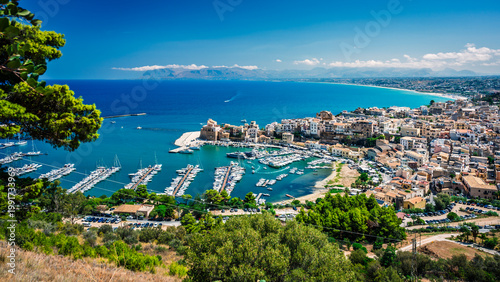 A magical summer holiday in Sicily. The Bay of Scopello, framed by its sea stacks, and the magical gulf of Castellammare del Golfo.