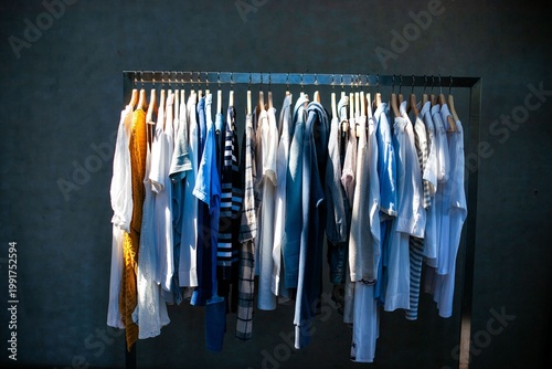 Colorful clothes hanging neatly