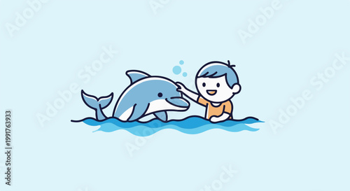 A happy child pets a smiling dolphin in the ocean