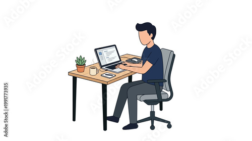 A young man sitting at a wooden desk while typing on his silver laptop computer in a casual professional style