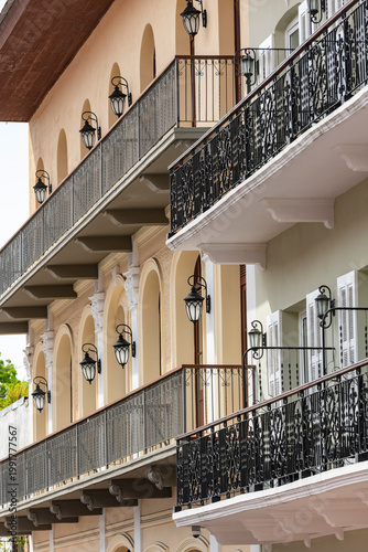 Casco viejo features a row of historical buildings with ornate iron balconies, decorative lanterns, and classic architectural details, reflecting Panama city's rich colonial heritage - stock photo