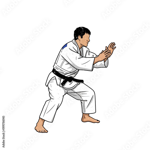 Martial artist in judogi performing a stance