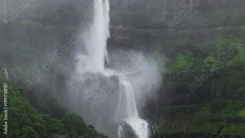 Moving Drone shot of a Huge explosive waterfall shot during heavy monsoon. Three tier waterfall. Tallest waterfall in India. Drone clip 4K60