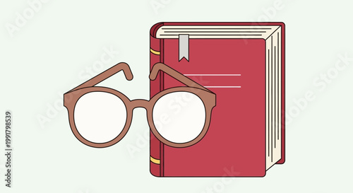 A pair of reading glasses resting on a closed book.