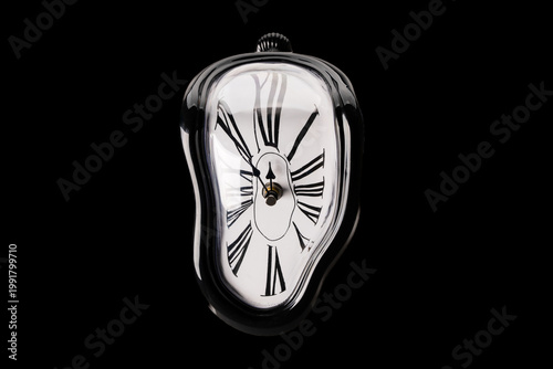 Melting clock on black background	
