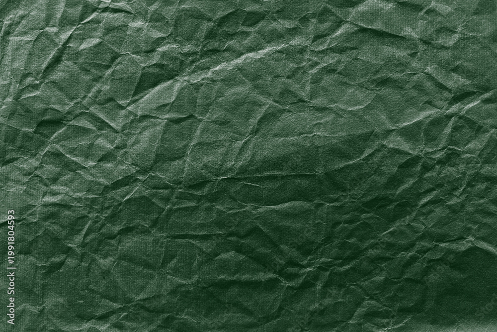 Fototapeta premium Textured green crumpled paper background