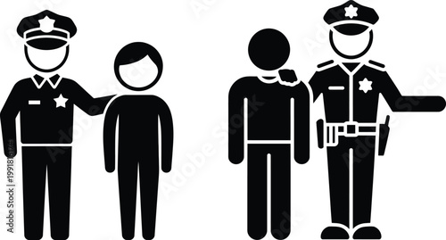 Two police officers escorting individuals in a controlled manner