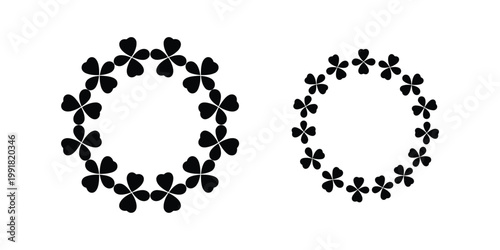 Wreath of clover leaves and flowers on white background, lucky charm.