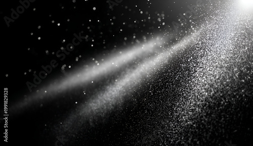 Abstract Light Rays and Dust Particles on Black Background.