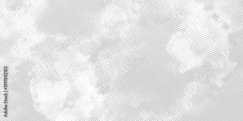 Abstract light grey halftone dot texture background. This minimalist design is perfect for web backgrounds, advertisements, and branding projects.