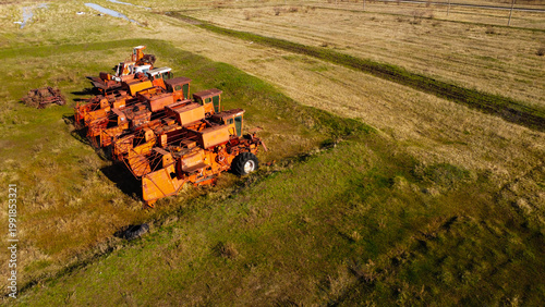 Abandoned Soviet Combine Harvesters in a Rural Field