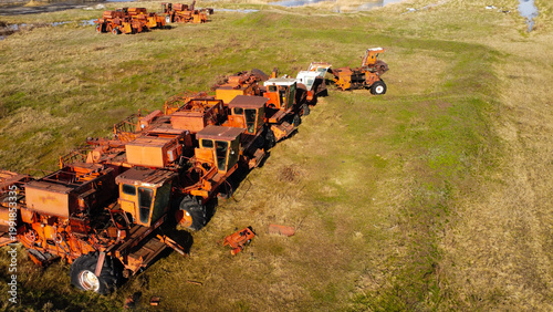 Abandoned Soviet Combine Harvesters in a Rural Field