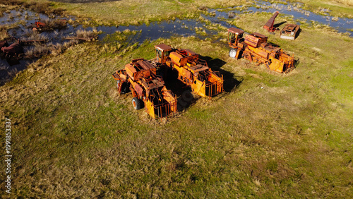 Abandoned Soviet Combine Harvesters in a Rural Field