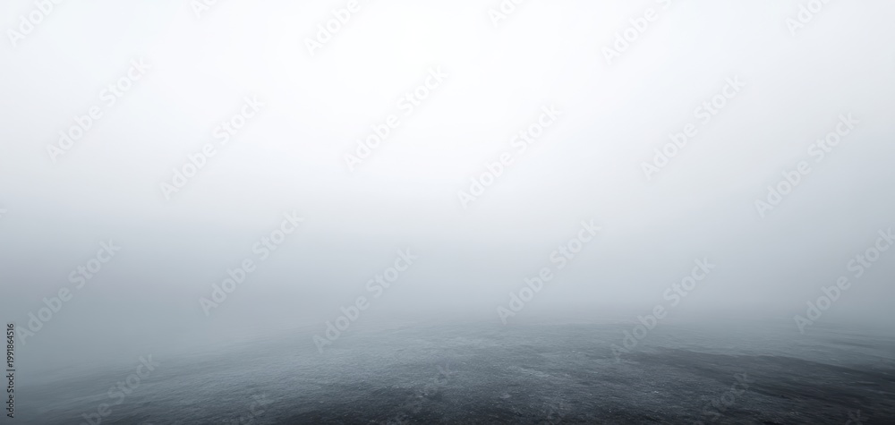 Fototapeta premium The Ocean Horizon Shrouded in Dense Fog with Minimalist Calm Water