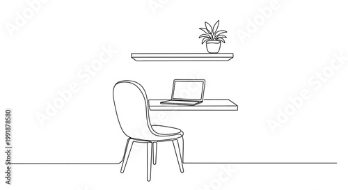 Chair with laptop on desk table.