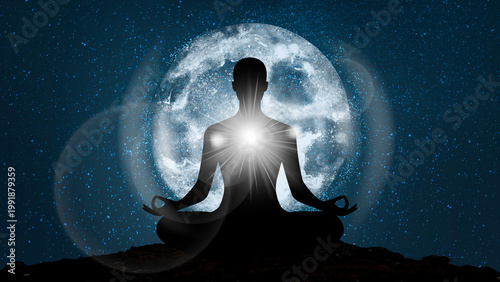 Obraz na plátně Meditative silhouette under moonlight image