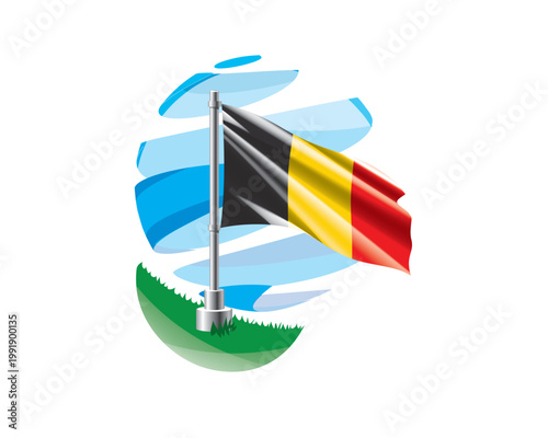 Belgian flag on a green lawn against a background of blue abstract sky