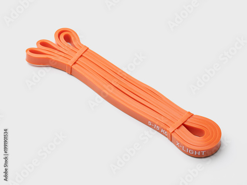 Fitness rubber band. Home exercise machine. Concept of sport and healthy active lifestyle. Set of colorful fitness rubber bands.