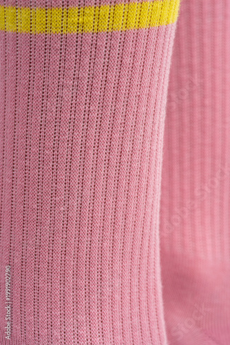 A cozy and comfortable photo of women's feet in soft socks. Colorful cotton socks.