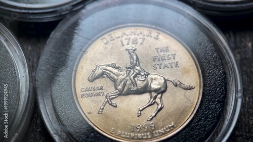 Macro Video of 1999 Delaware State Quarter Dollar Coin with Caesar Rodney Design