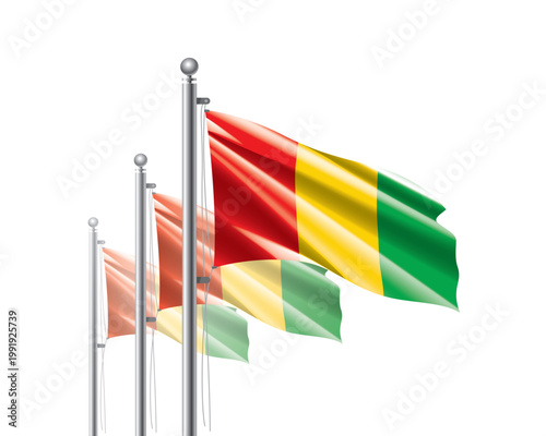 Brightly shining Guinean flags wave proudly on tall masts during official celebration events