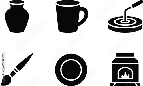 Set of six black pottery and ceramics including a vase, mug, wheel, brush, plate, and kiln