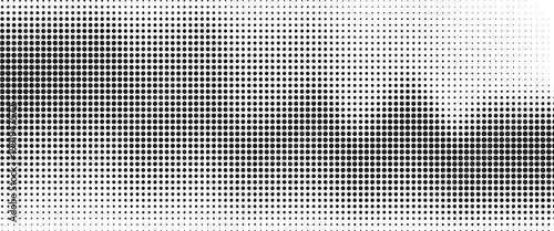 Monochrome halftone background with a gradient of dots creating a modern and minimalist design element EPS vector