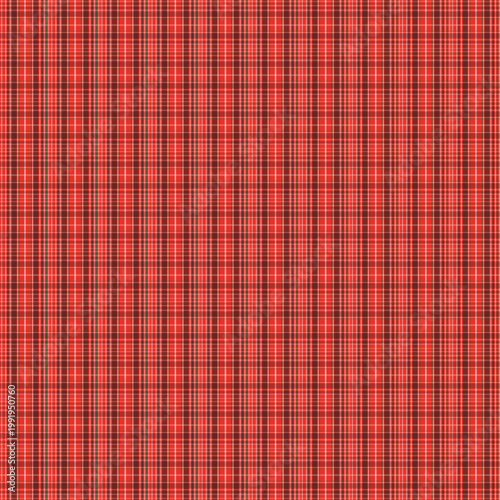 Seamless pattern. Red plaid fabric texture in Scottish style 