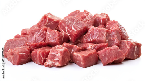 A pile of raw red meat cut into small cubes on a white background